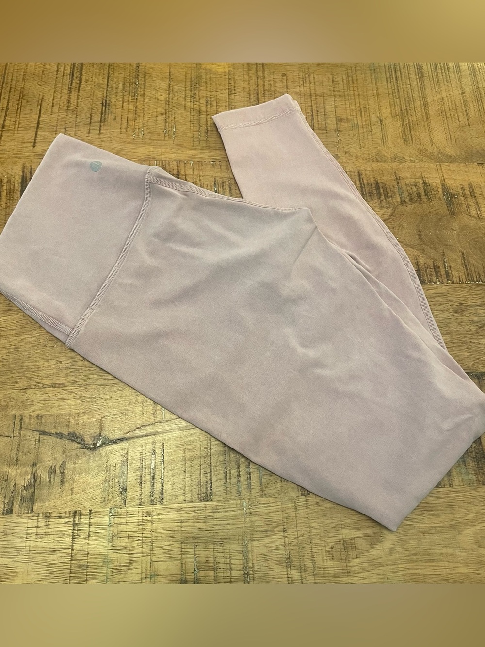 Lululemon 
Light pink high-waisted leggings 
Size 6